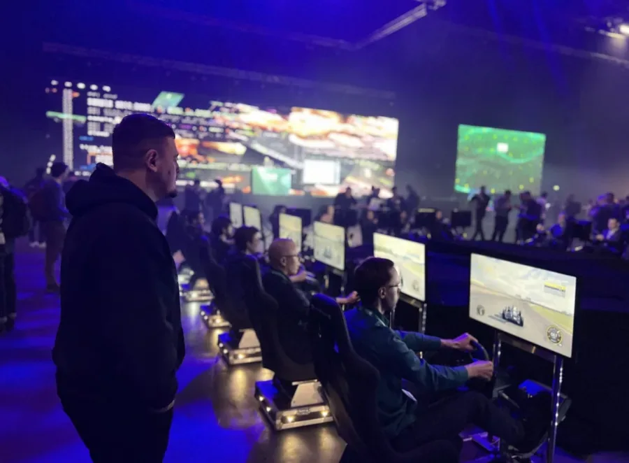 Guests racing head to head on networked simulators